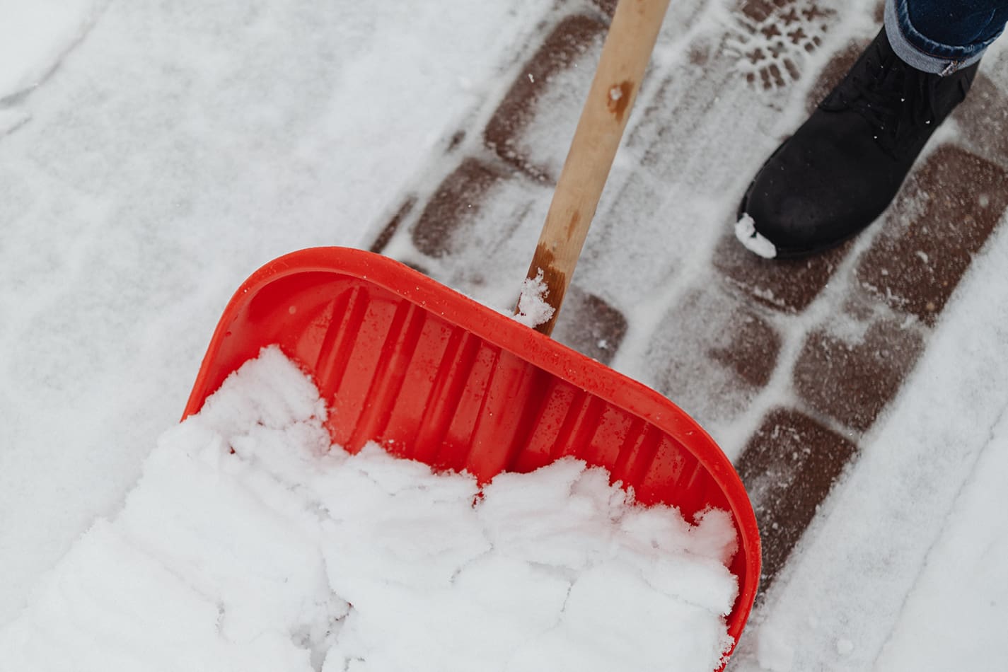 Shoveling Snow From The Front Walk